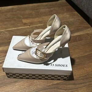 Brand New No. 55 decorated heel pumps. Tan color satin shoe Size (Euro 38)